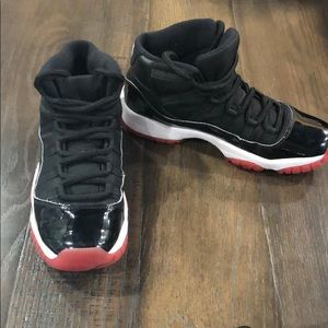 Big boys 6y Retro 11 red and black Jordan’s